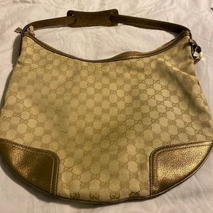 Authentic Gucci BronzeTan Canvas and Leather Bag.